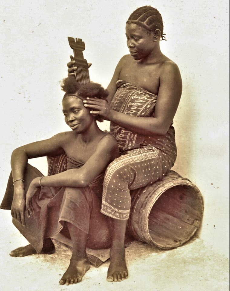 antique photo zanzibar ladies hair combing with wooden comb