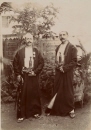 Two European men in Omani official costumes